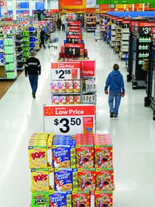 inside a big box store showing an isle of food.