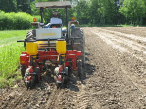 tractor tilling a field