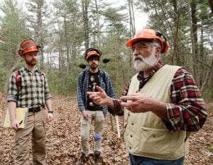 Tom Worthely and other instructors in the woods