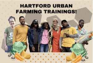 group of urban farmers smiling and hugging