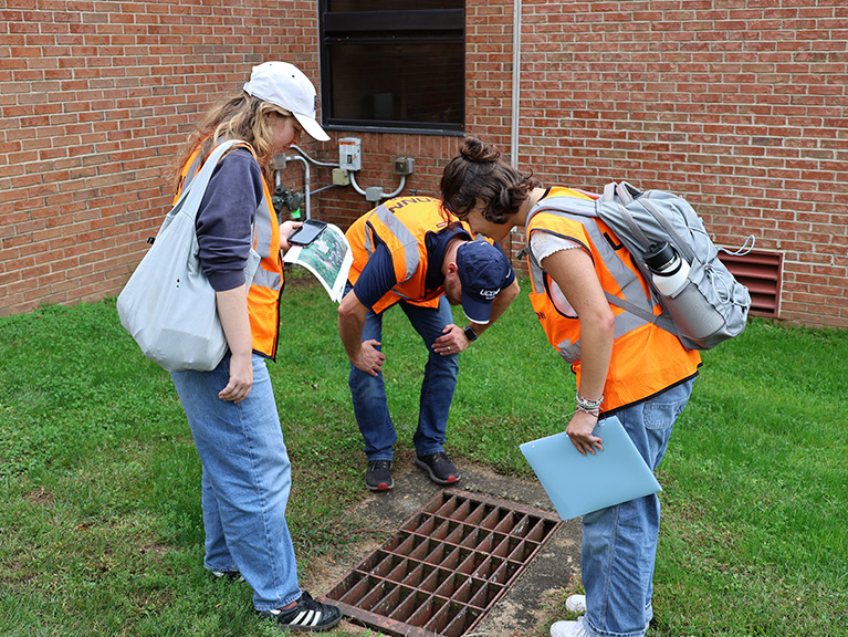 Students on a demonstration site walk for e-corps