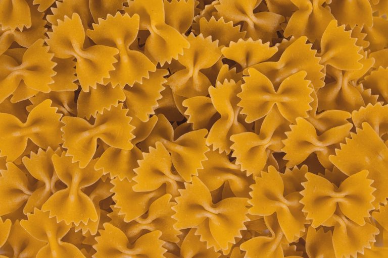 (engin akyurt/unsplash) A close up image of yellow uncooked pasta