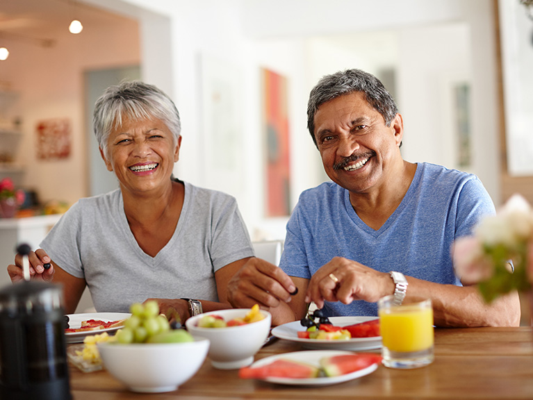 seniors eating at a table