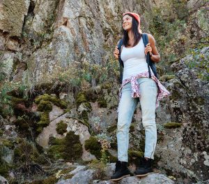 woman on a walk with a backpack